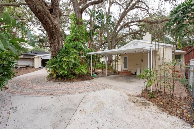 exterior space featuring a carport