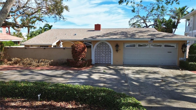 ranch-style house with a garage