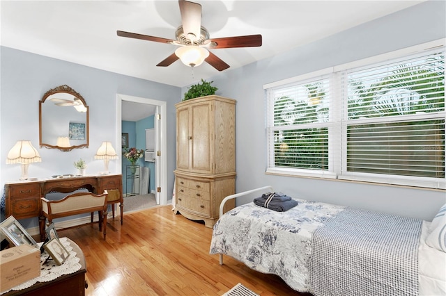 bedroom featuring ceiling fan and light wood-type flooring