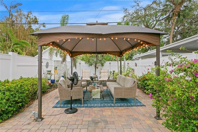 view of patio featuring a gazebo and outdoor lounge area