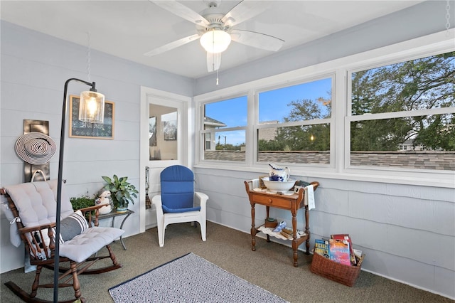 sunroom / solarium with ceiling fan