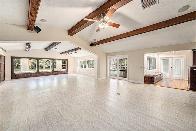 unfurnished living room featuring french doors, lofted ceiling with beams, ceiling fan, light wood-type flooring, and a textured ceiling