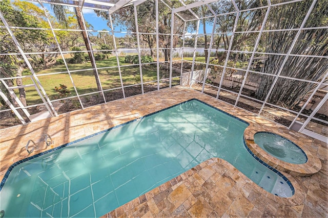 view of pool with glass enclosure, a patio area, and an in ground hot tub