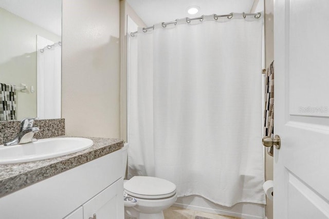 full bathroom with shower / tub combo with curtain, vanity, toilet, and tile patterned flooring