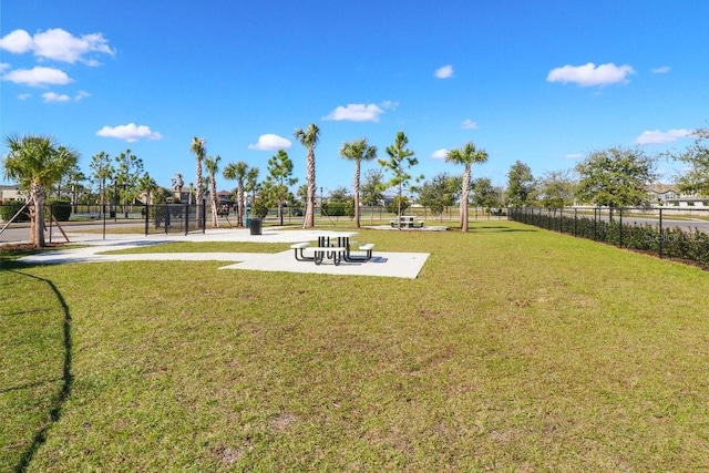 9407 Channing Hill Dr, Ruskin, FL 33573 - view of home's community with a yard and fence