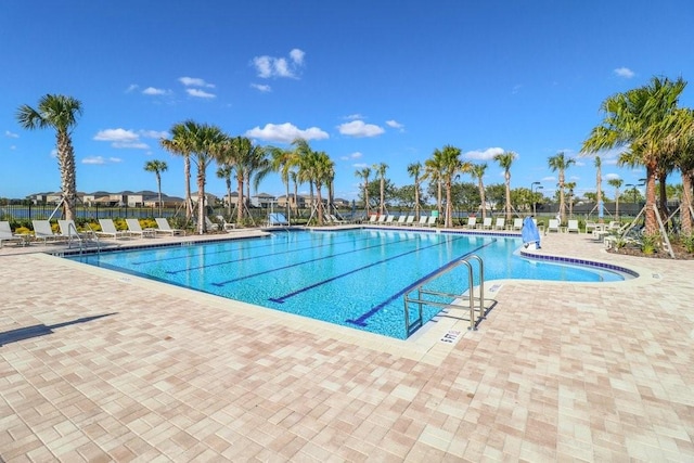 9407 Channing Hill Dr, Ruskin, FL 33573 - pool featuring fence and a patio area