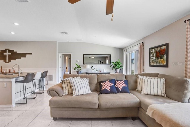 9407 Channing Hill Dr, Ruskin, FL 33573 - living area featuring light tile patterned floors, ceiling fan, lofted ceiling, visible vents, and recessed lighting