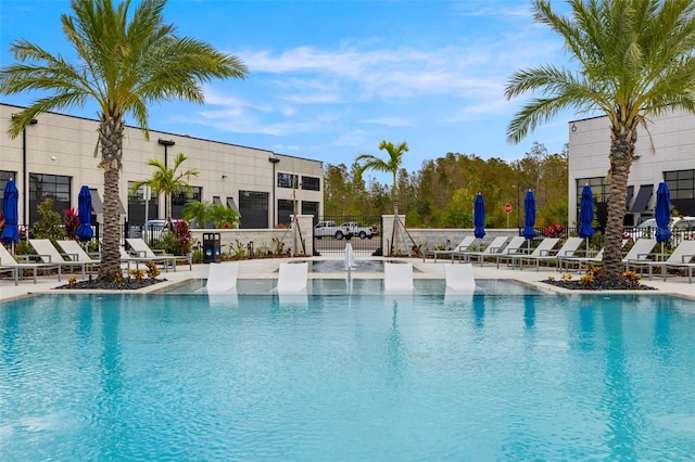 view of pool featuring pool water feature