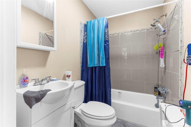 full bathroom featuring toilet, shower / tub combo, and vanity