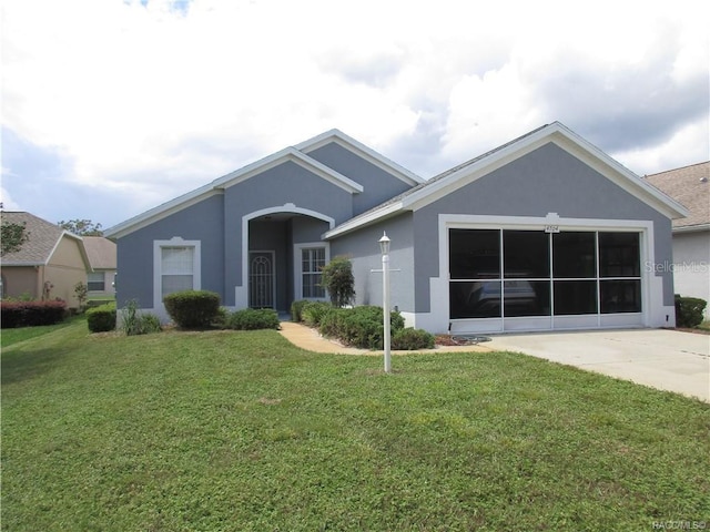 ranch-style house with a front yard