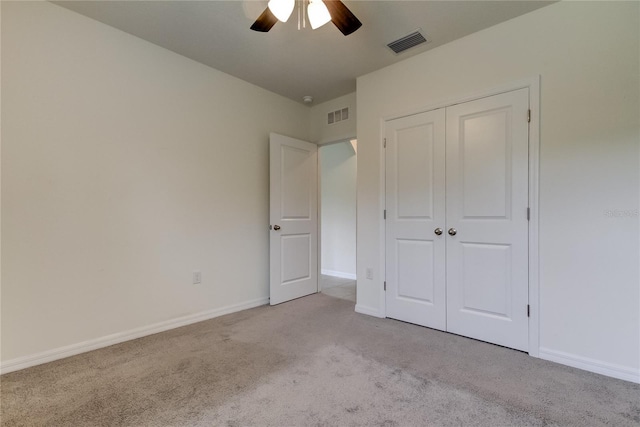 33351 Apricot Tree Ct, Wesley Chapel, FL 33543 - unfurnished bedroom featuring light carpet, a closet, and ceiling fan