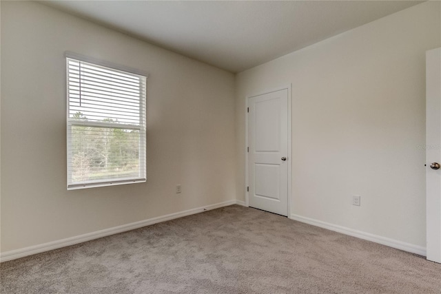33351 Apricot Tree Ct, Wesley Chapel, FL 33543 - empty room with light colored carpet and baseboards