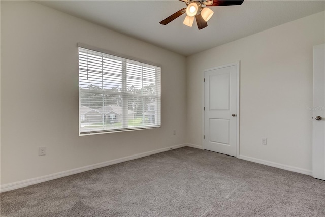 33351 Apricot Tree Ct, Wesley Chapel, FL 33543 - carpeted spare room with a ceiling fan and baseboards