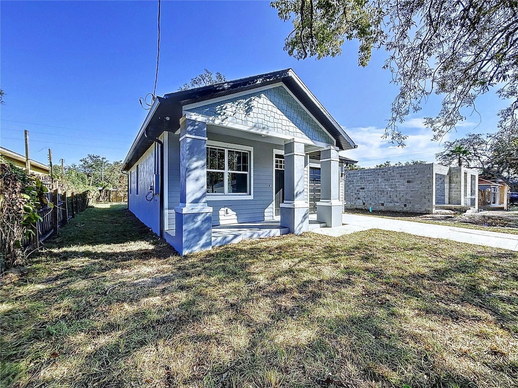 view of front of home with a front lawn