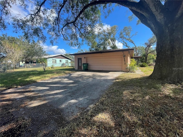 view of side of home featuring a yard