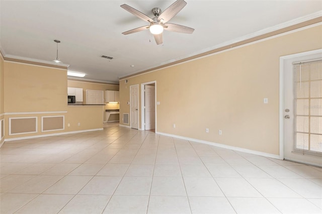 unfurnished living room featuring ceiling fan, light tile patterned floors, and ornamental molding