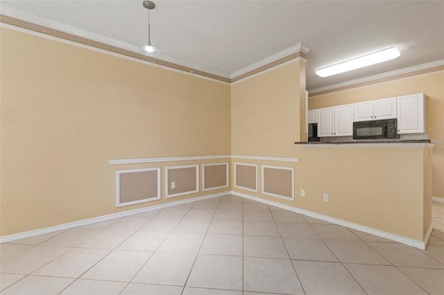 tiled empty room with crown molding