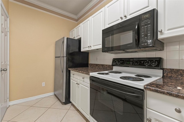 kitchen with tasteful backsplash, light tile patterned flooring, dark stone counters, white range with electric stovetop, and white cabinets