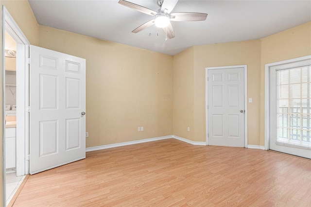 unfurnished room with ceiling fan and light hardwood / wood-style flooring