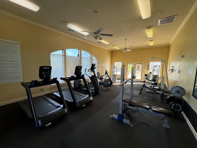 exercise room featuring french doors, ceiling fan, a textured ceiling, and crown molding