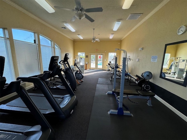 workout area featuring french doors, ceiling fan, a textured ceiling, and crown molding