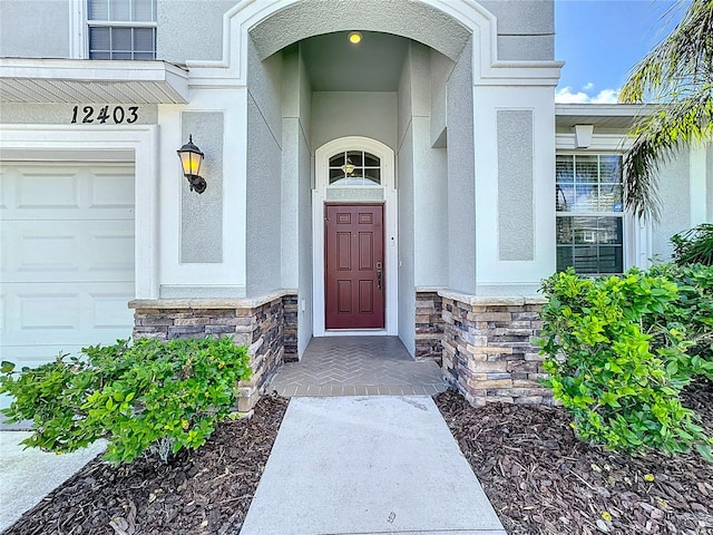 property entrance featuring a garage