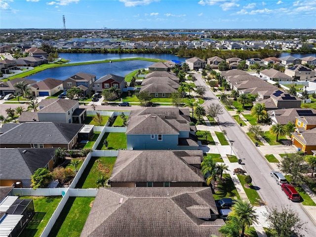 bird's eye view with a water view