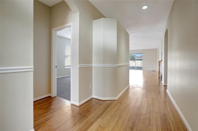 hall with light hardwood / wood-style floors