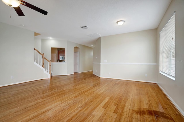 interior space with ceiling fan and light wood-type flooring