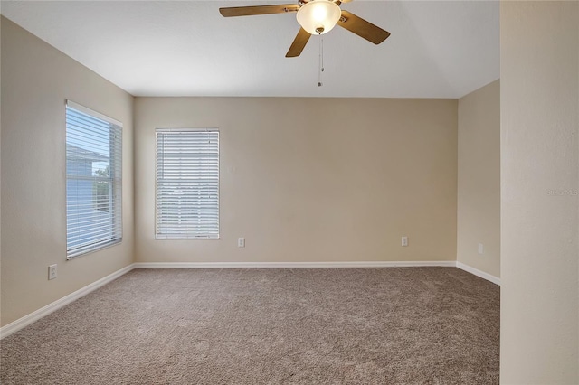 carpeted empty room with ceiling fan