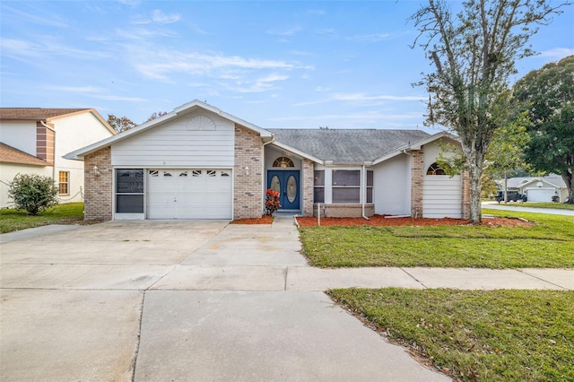 ranch-style home with a garage and a front yard