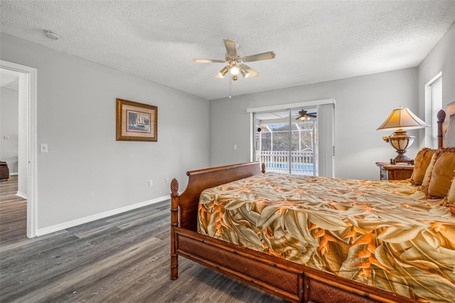 bedroom with dark wood-type flooring, access to outside, a textured ceiling, and ceiling fan