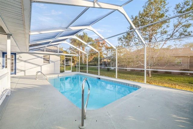 8404 Millwood Dr, Hudson, FL 34667 - outdoor pool featuring a patio area, a lawn, and a lanai