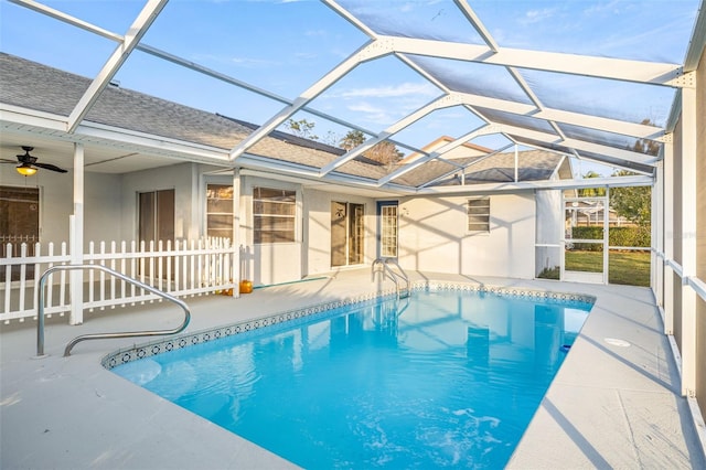 view of pool featuring a patio, a lanai, and ceiling fan