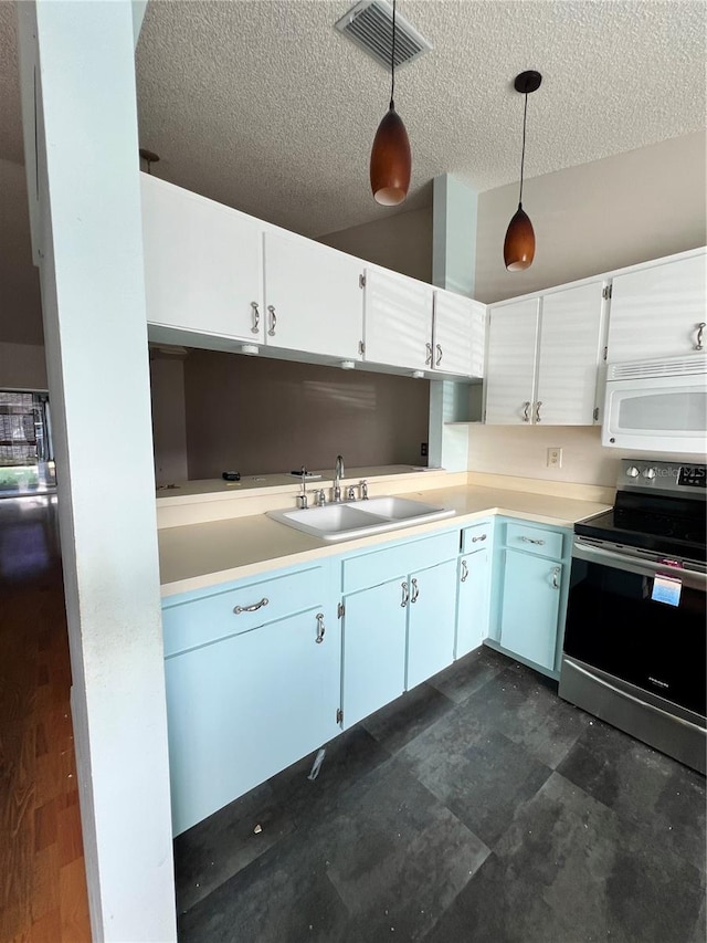 kitchen with stainless steel range with electric stovetop, a textured ceiling, sink, pendant lighting, and white cabinetry