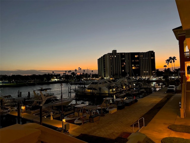 property view of water featuring a boat dock