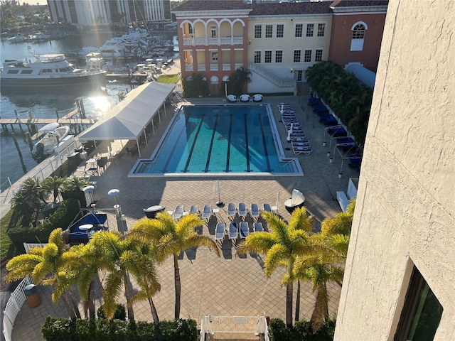 birds eye view of property with a water view