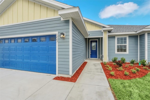 entrance to property featuring a garage