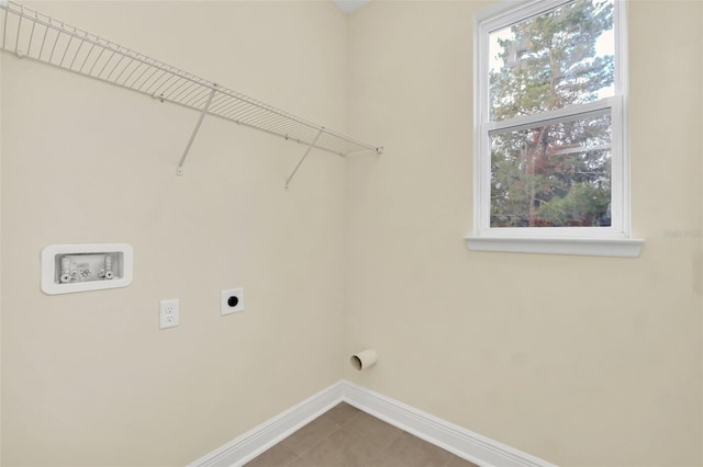 clothes washing area featuring washer hookup, tile patterned flooring, and hookup for an electric dryer