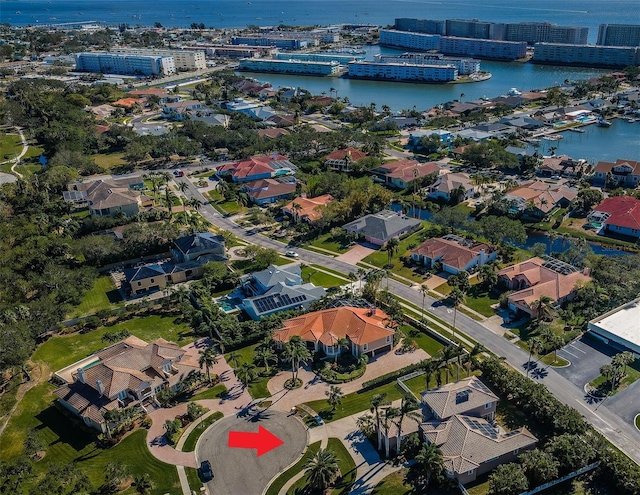 birds eye view of property featuring a water view