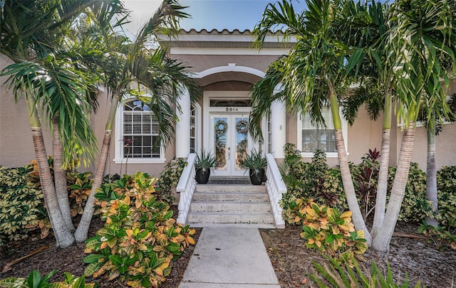 entrance to property featuring french doors