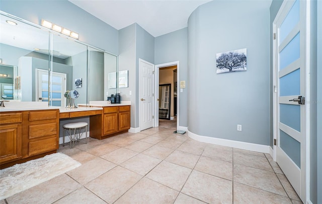 bathroom with vanity and tile patterned floors