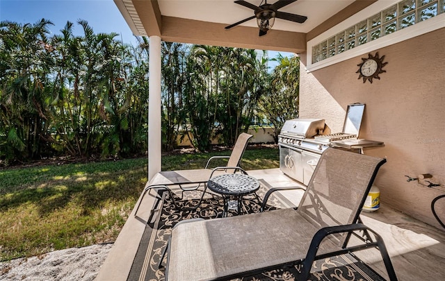 view of patio / terrace featuring ceiling fan