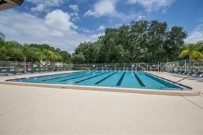 view of swimming pool with a patio area