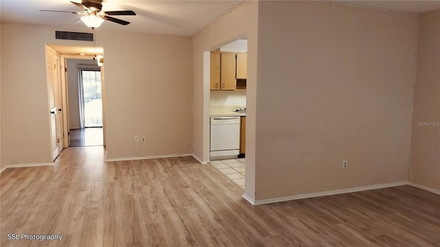 unfurnished room with light hardwood / wood-style flooring and ceiling fan