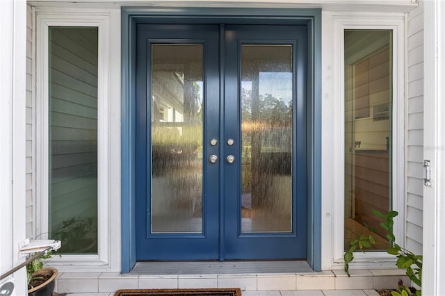 2516 Roberta St, Largo, FL 33771 - view of exterior entry featuring french doors