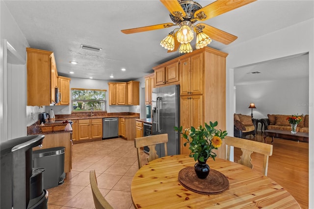 2516 Roberta St, Largo, FL 33771 - dining space with ceiling fan, recessed lighting, and light tile patterned floors