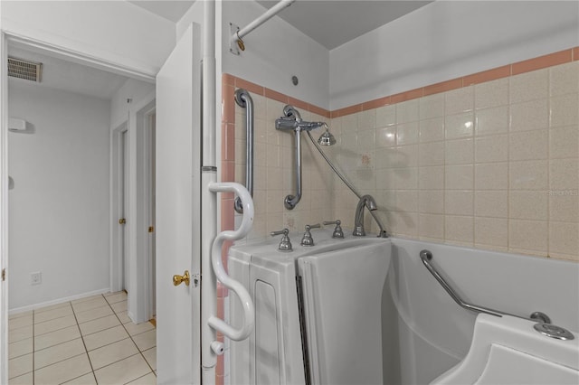 washroom featuring light tile patterned floors