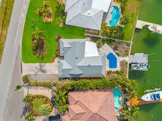 drone / aerial view featuring a water view