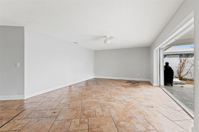 spare room featuring ceiling fan